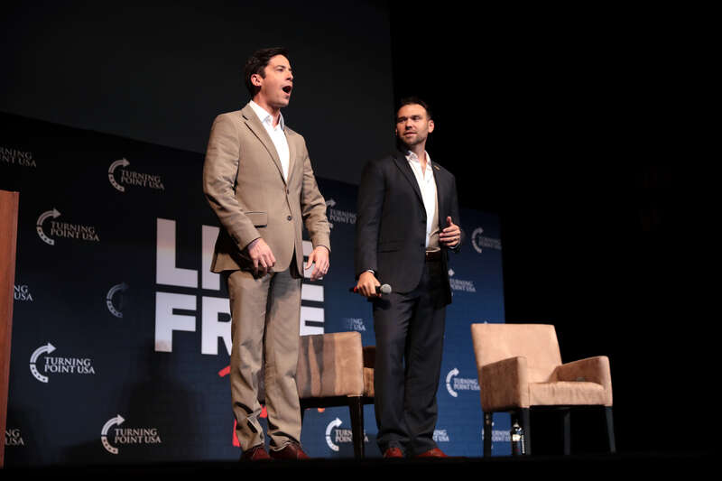 Michael Knowles and Jack Posobiec speaking with attendees at the University of Delaware tour stop of the "Live Free" tour at Mitchell Hall in Newark, Delaware.

Please attribute to Gage Skidmore if used elsewhere.
