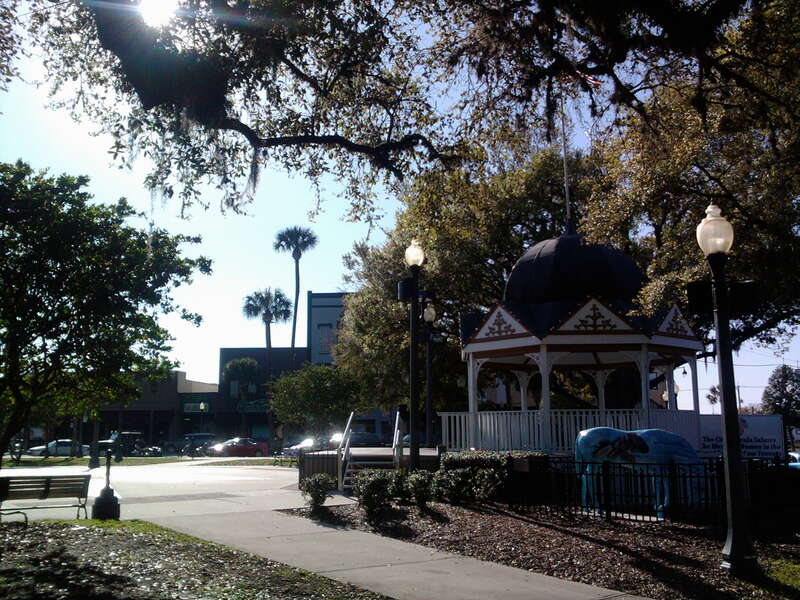 View of Ocala's Downtown Square Gazebo and "Horse Fever" sculpture.  Ocala is known for its rolling hills, majestic oaks, and as the "Horse Capital of the World."