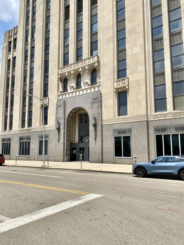 Built in 1930, this Art Deco-style building was designed by Schenck and Williams for the Ohio Bell Telephone Company to serve as their offices and main switchboard in Downtown Dayton.  The building features a granite base, a limestone exterior, a
