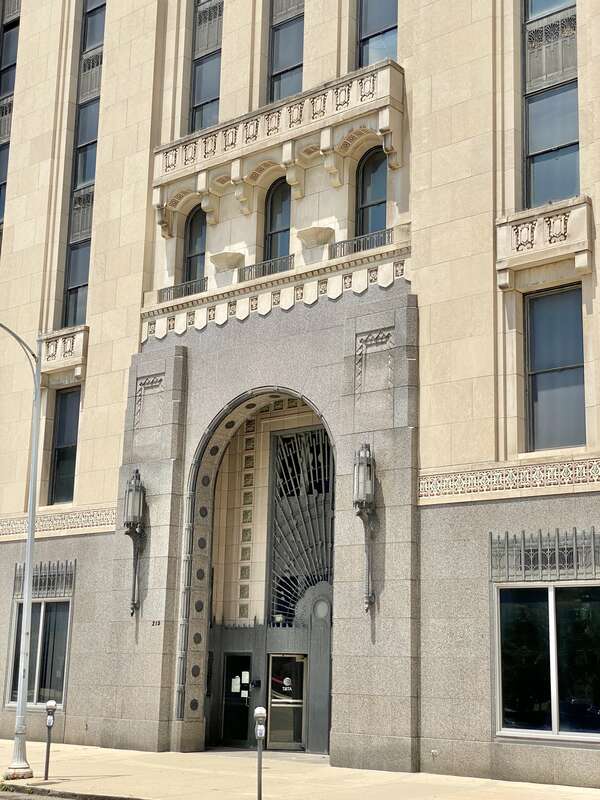 Built in 1930, this Art Deco-style building was designed by Schenck and Williams for the Ohio Bell Telephone Company to serve as their offices and main switchboard in Downtown Dayton.  The building features a granite base, a limestone exterior, a