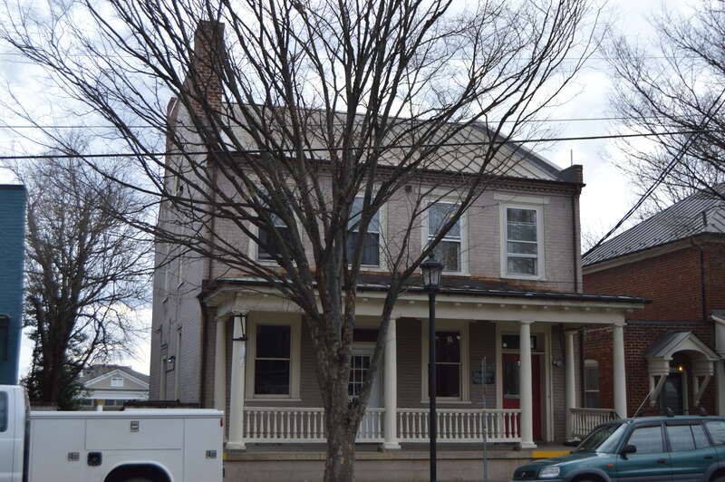 Front and western side of the Paxton Place, located at 503 W. Main Street in Charlottesville, Virginia, United States.  Built in 1824, it is listed on the National Register of Historic Places.