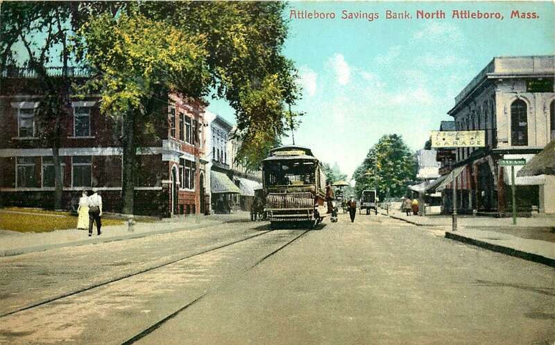 Divided back postcard of an Interstate Consolidated Street Railway car on North Washington Street next to the Attleboro Savings Bank (left) in North Attleborough, Massachusetts