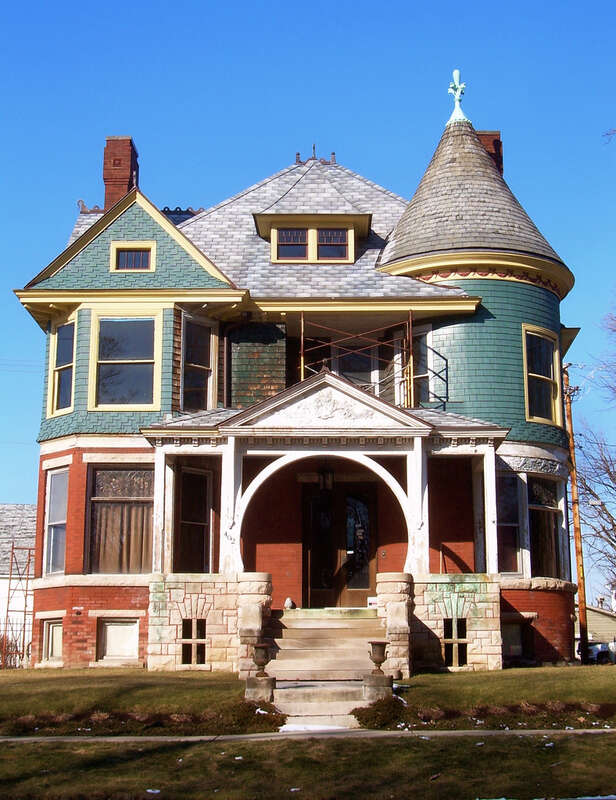 A Queen Anne style house in Bloomington, Illinois. Oscar &amp; Sara Mandel House, 402 E. Grove St., East Grove Street District, Bloomington, Illinois. Moved to 402 E Grove in 2004 from 507 E. Washington.