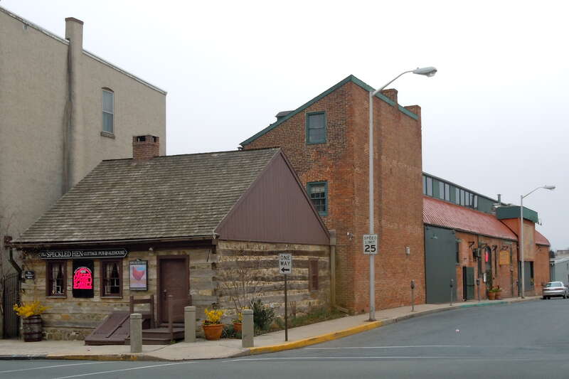 Speckled Hen (bar) aka Log House, Hiester House and Market Annex on the NRHP since November 20, 1979. At 30 South 4th Street, right in downtown Reading, Pennsylvania.  An odd combination but it looks like it works pretty well.