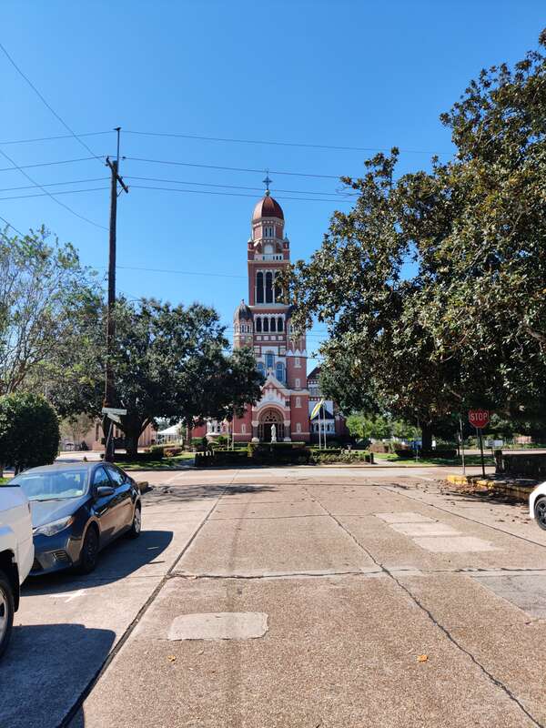This is a photograph of the Cathedral of Saint John the Evangelist in Lafayette, Louisiana, United States; it was taken on 16 October 2021 during the Boudin Festival in the afternoon.