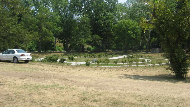 A sunken rose garden on the western side of Michigan Street at Leeper Park in South Bend, Indiana, United States.  The park and several related buildings compose a historic district that is listed on the National Register of Historic Places.