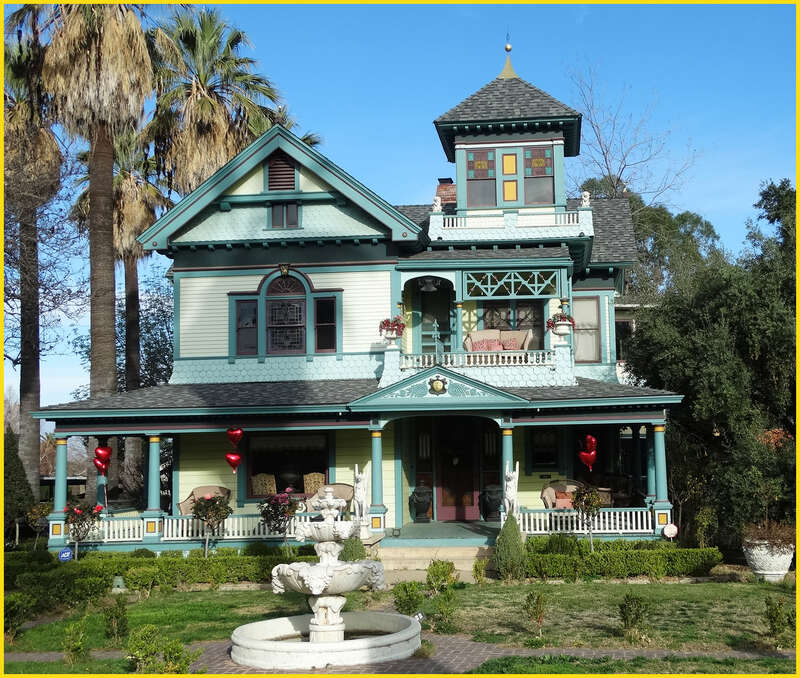 (1 in a multiple picture set)
This home has recently sold.  The owners before would really decorate this up on Halloween to look like a haunted house.  Now it is painted nicely and has a lot of interesting detail, including a fountain and rose garden