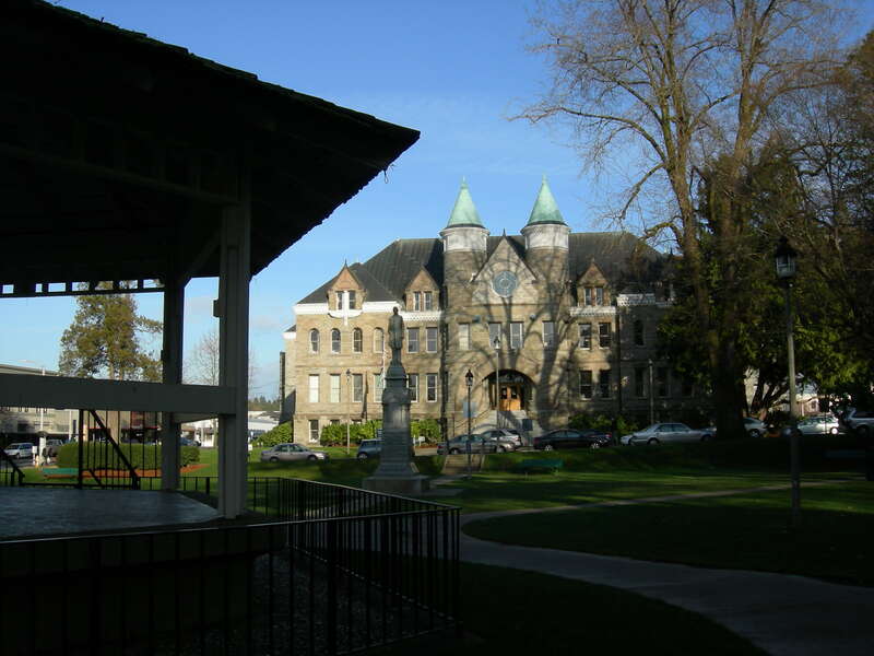 HQ of the Washington State Superintendent of Public Instruction, downtown Olympia, Washington, seen from Sylvester Park. Statue in middle ground is John Rankin Rogers.
Designed by Willis A. Ritchie and built 1890–1892 as the Thurston County