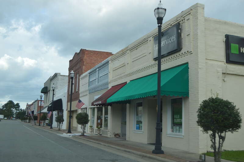 Buildings on the eastern side of Front Street north of College Street in Warsaw, North Carolina, United States.  This block is part of the Warsaw Historic District, a historic district that is listed on the National Register of Historic Places.