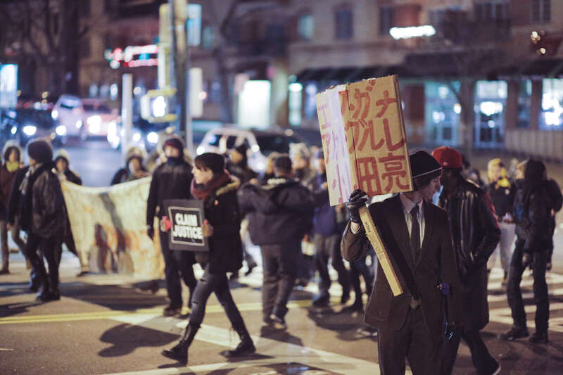 
500px provided description: St. George, Staten Island, NY
December 19, 2014

Protestors march up Bay Street towards the site of Eric Garner's death. [#march ,#protest ,#blm ,#black lives matter ,#blacklivesmatter]