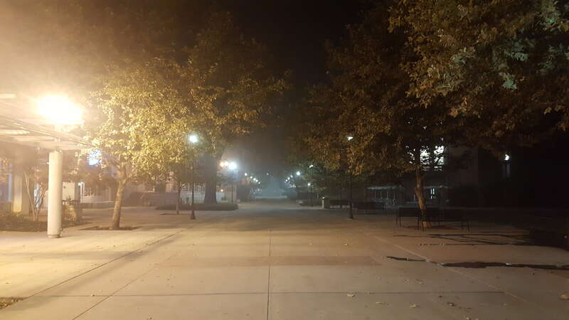 Smoke from the Camp Fire hangs over the CSU Chico campus during a night of "Hazardous" air quality