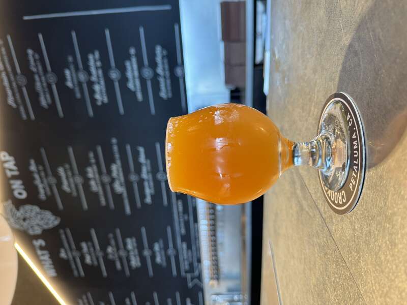 Grain &amp; Blood blood orange DIPA at Crooked Goat Brewing in December 2023