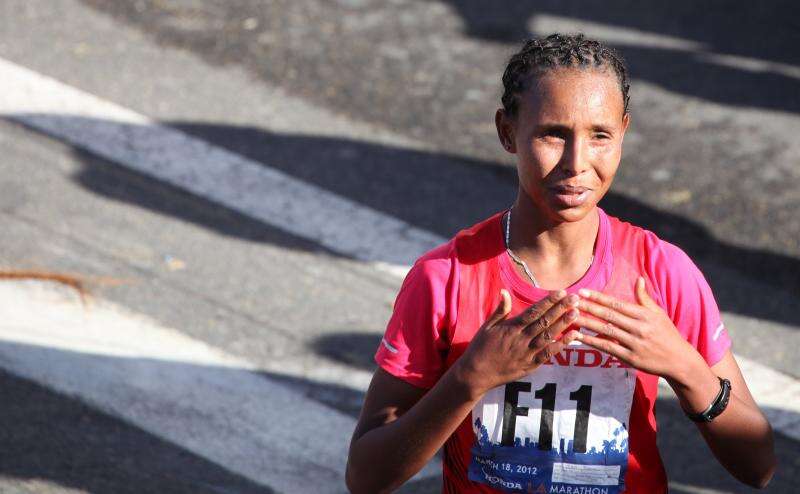 Fatuma Sado of Ethiopia seconds after winning the 2012 LA Marathon. Related photo post: <a href="http://michaeldorausch.com/2012-los-angeles-marathon-winner-photos/" rel="nofollow">2012 Los Angeles Marathon Winner Photos</a>