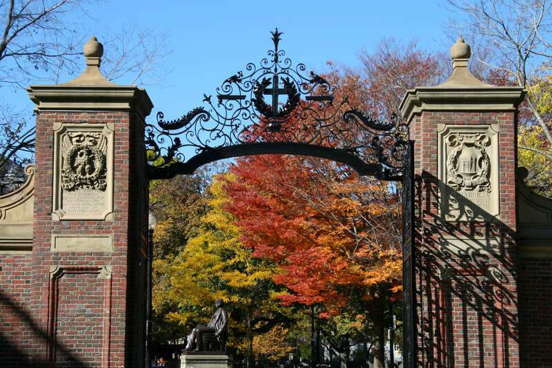 The gates to Harvard with fall foliage behind them.
Shot with Canon XTi | EF-S17-85mm f/4-5.6 IS USM @ 47 mm

1/125 sec at f/9.0 | ISO100 | no flash