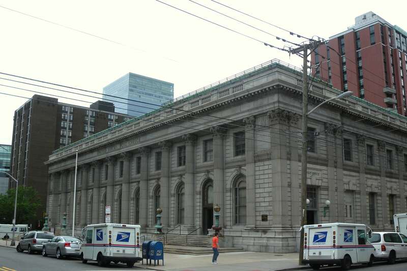 Looking northeast across Washington and York Streets at Post Office, built in 1911, on a cloudy morning.  Part of Paulus Hook Historic District.[1]