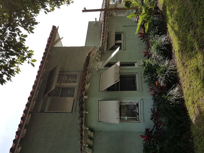 James D. and Alice Butler House SW view first floor bay back of house