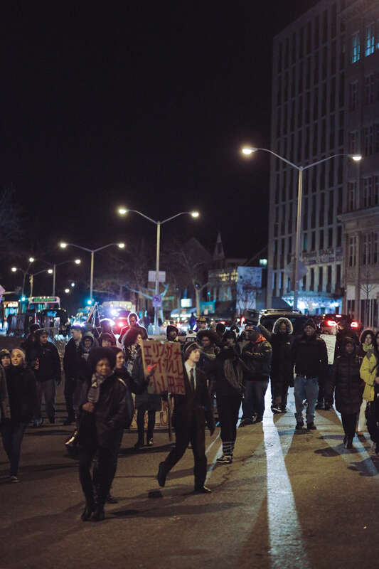 500px provided description: Tompkinsville, Staten Island, NY
December 19, 2014

Protestors march towards the Staten Island Supreme Courthouse after convening at the site of Eric Garner's death. [#march ,#protest ,#blm ,#black lives matter