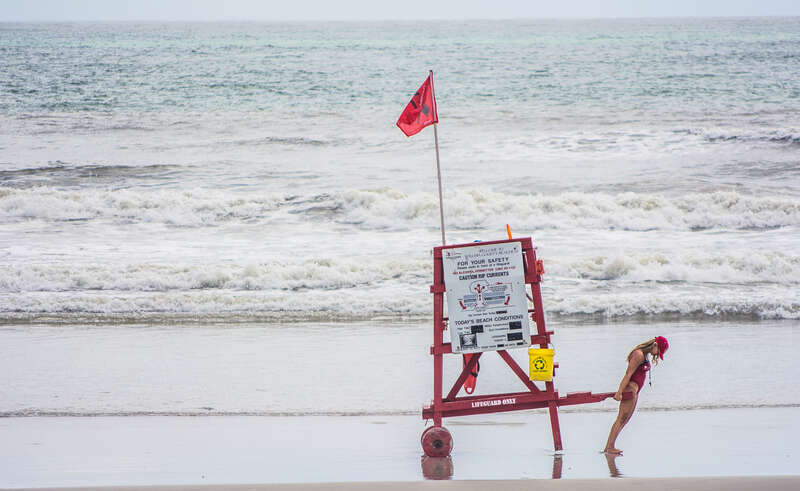 
500px provided description: On Duty [#beach ,#lifeguard ,#Landscape ,#Ocean]