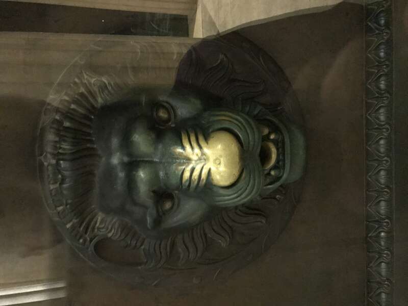 Lion face on door into Nashville Parthenon