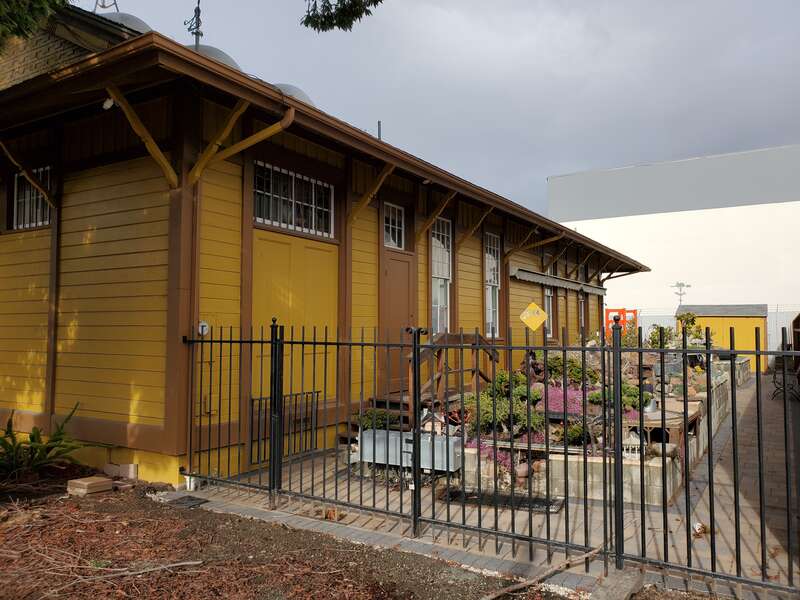 The rear (originally the side away from the tracks) of the former San Leandro station building in February 2021
