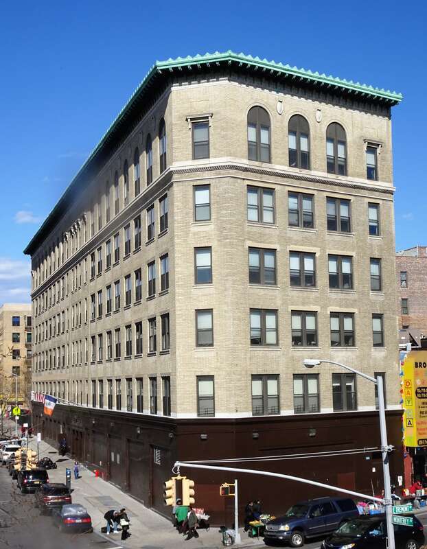Looking northeast at a building for food stamps, welfare, and similar municipal functions.