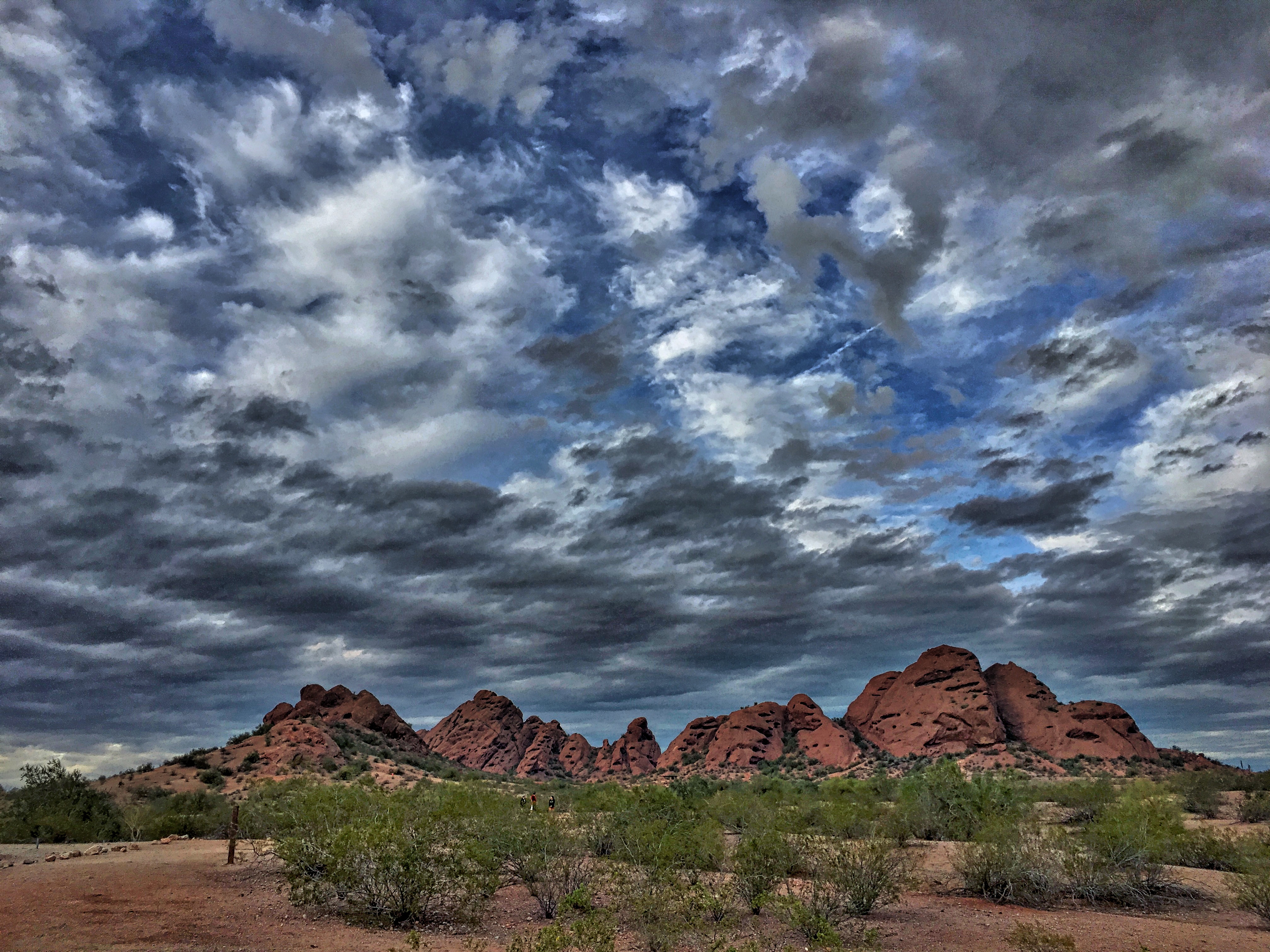 Lovely red pockmarked rocky buttes in Papago Park, Phoenix, pinked up with a bit of HDR.  They are great to scamper up.