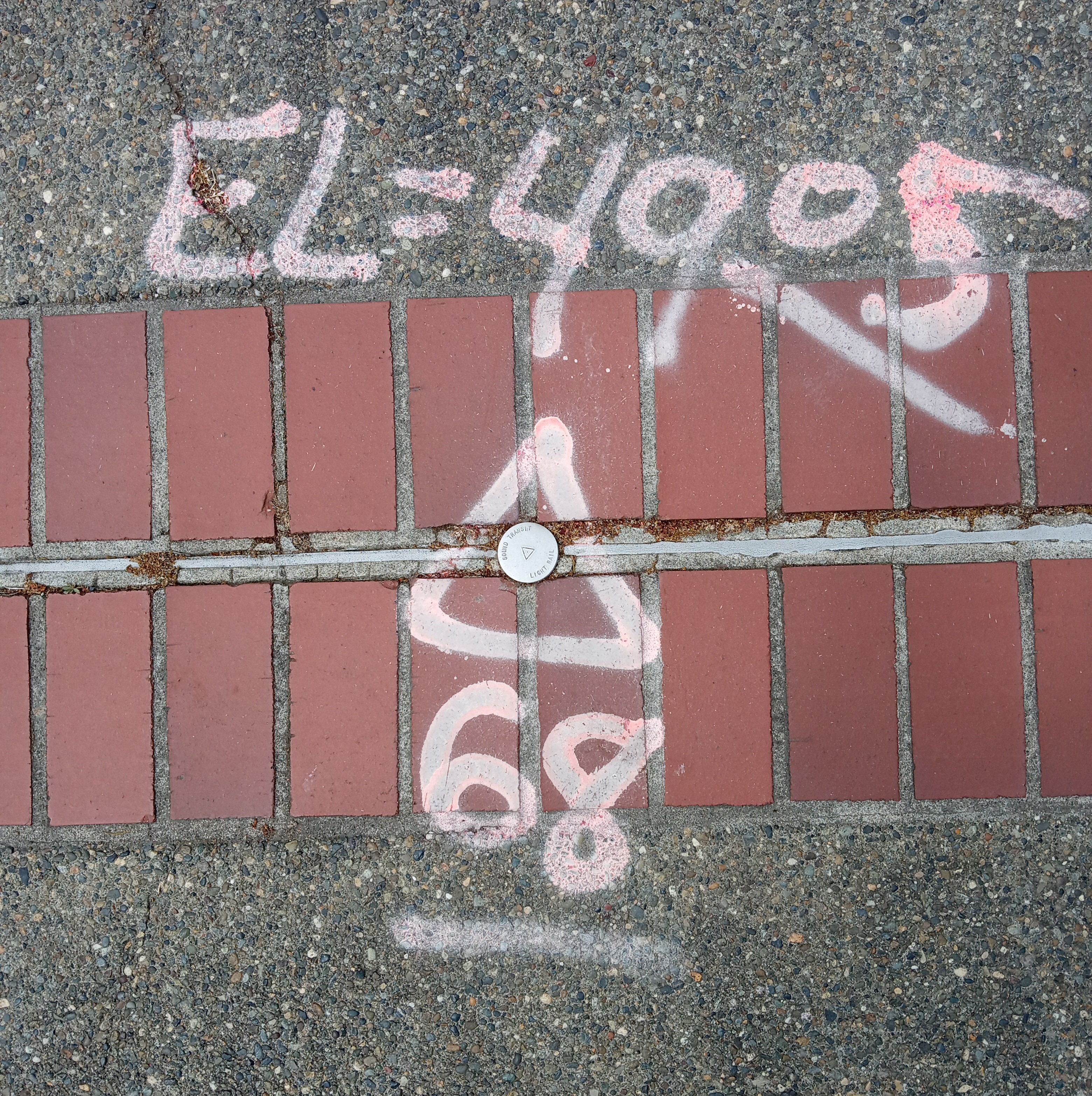 Sound Transit light rail geodetic marker. Tacoma, Washington
