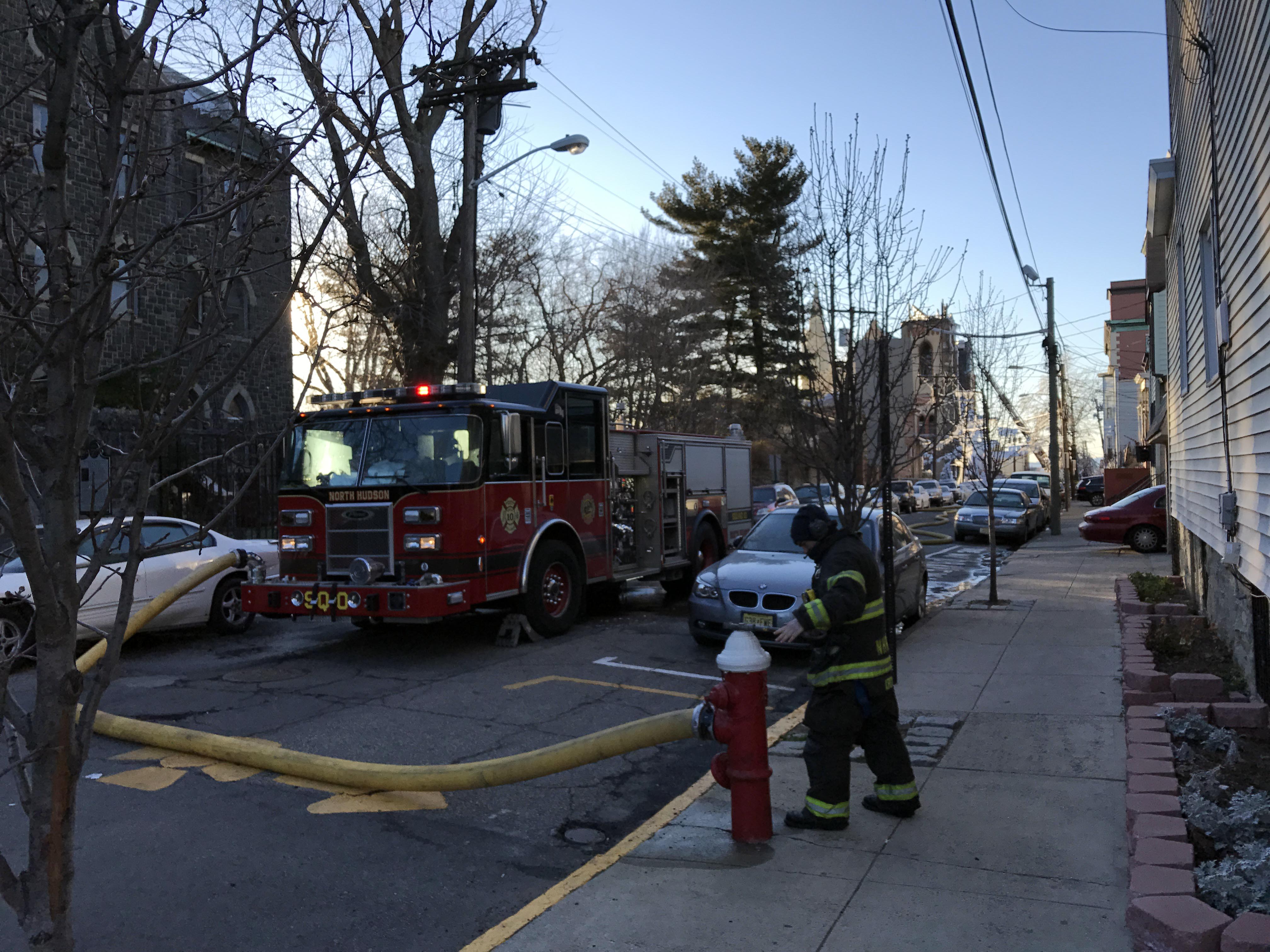 Looking west on 14th Street from the corner of West Street in Union City, New Jersey, in the late afternoon of March 4, 2017. In the background is the remains of SS. Joseph and Michael Parish Church on Central Avenue, to which a six-alarm fire that