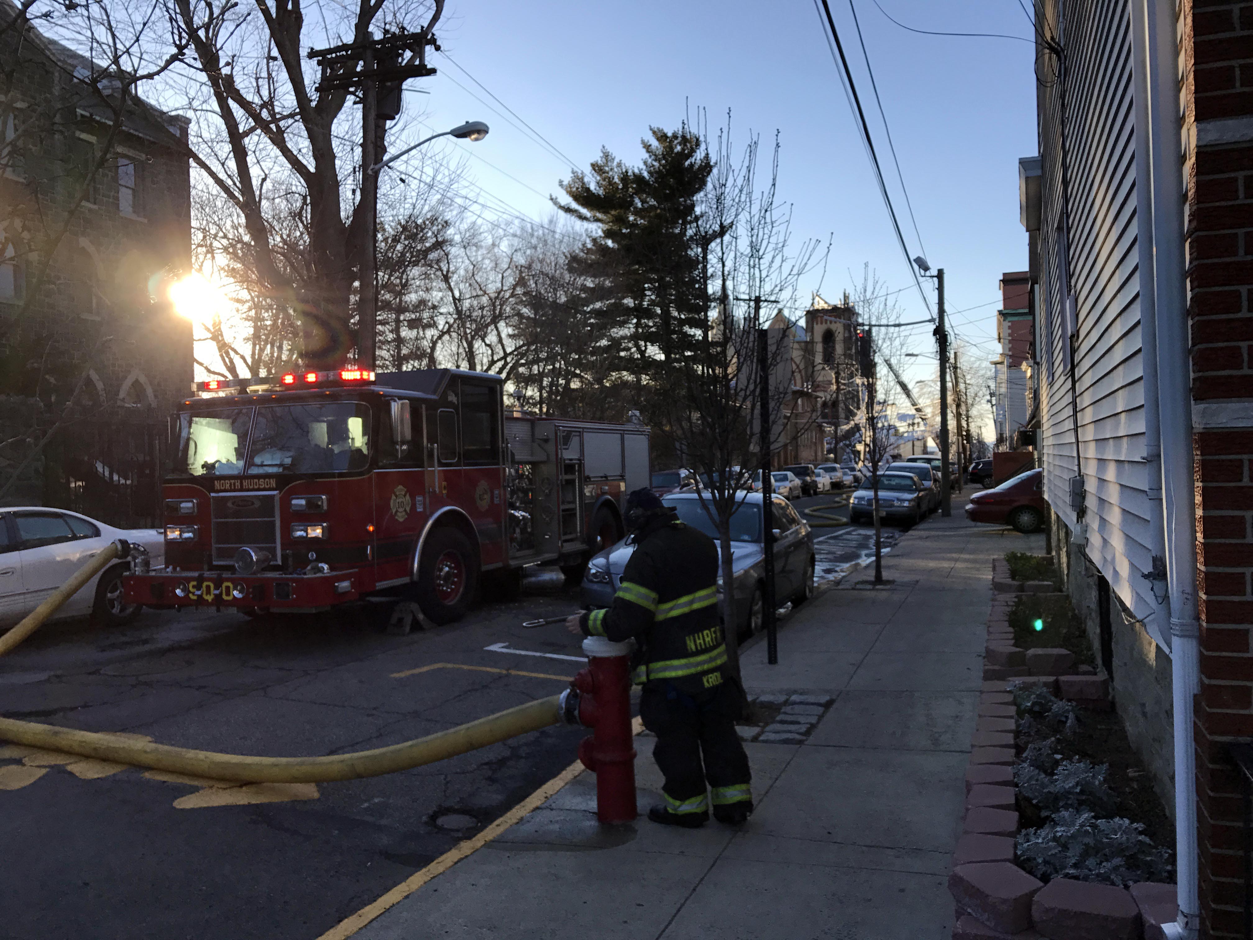 Looking west on 14th Street from the corner of West Street in Union City, New Jersey, in the late afternoon of March 4, 2017. In the background is the remains of SS. Joseph and Michael Parish Church on Central Avenue, to which a six-alarm fire that