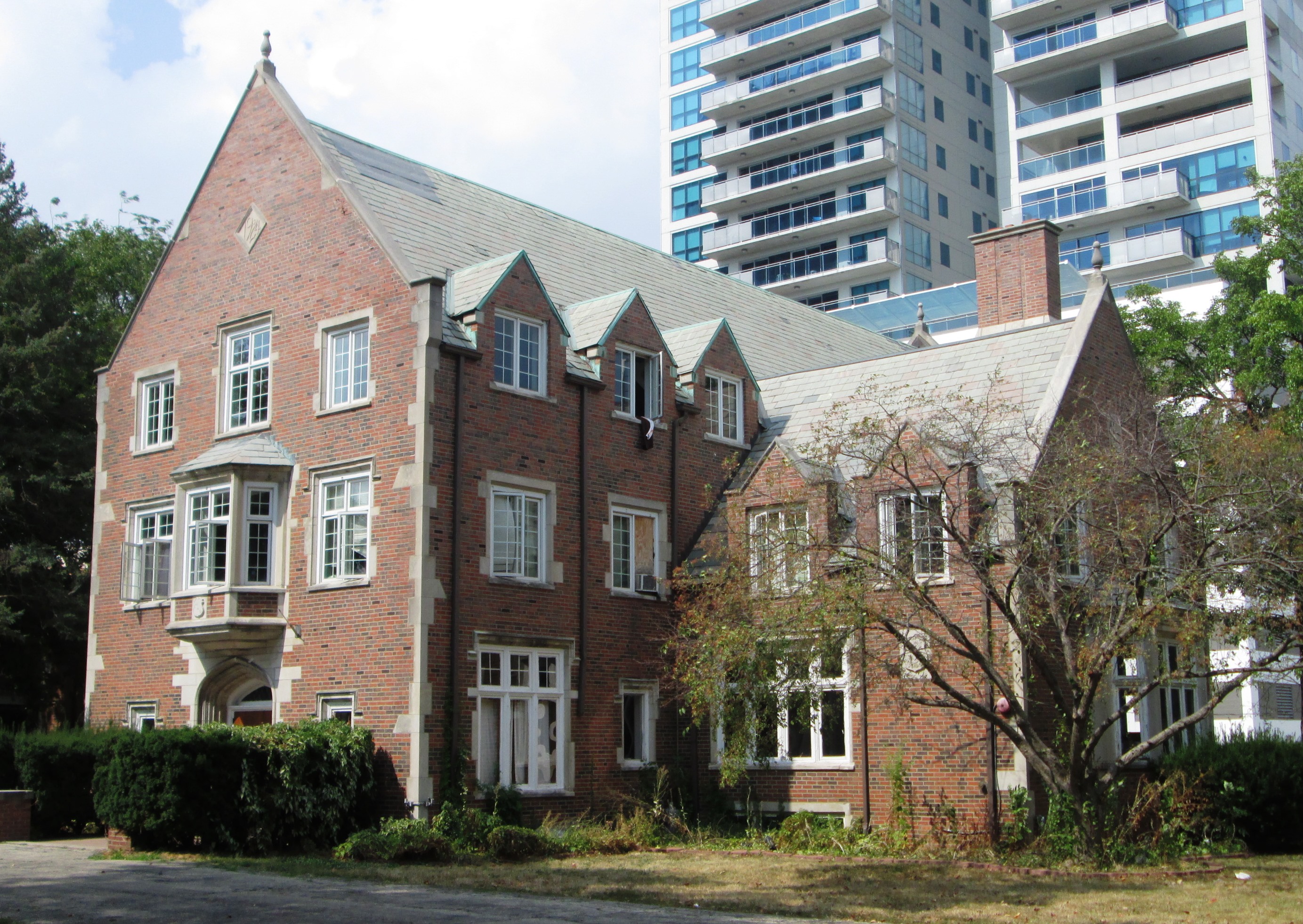 The Illinois Chaper House of the Alpha Delta Phi Fraternity at 310 East John Street in Champaign, Illinois was built in 1924, and was designed by Ralph W. Varney in the Tudor Revival style. (Source: [1])