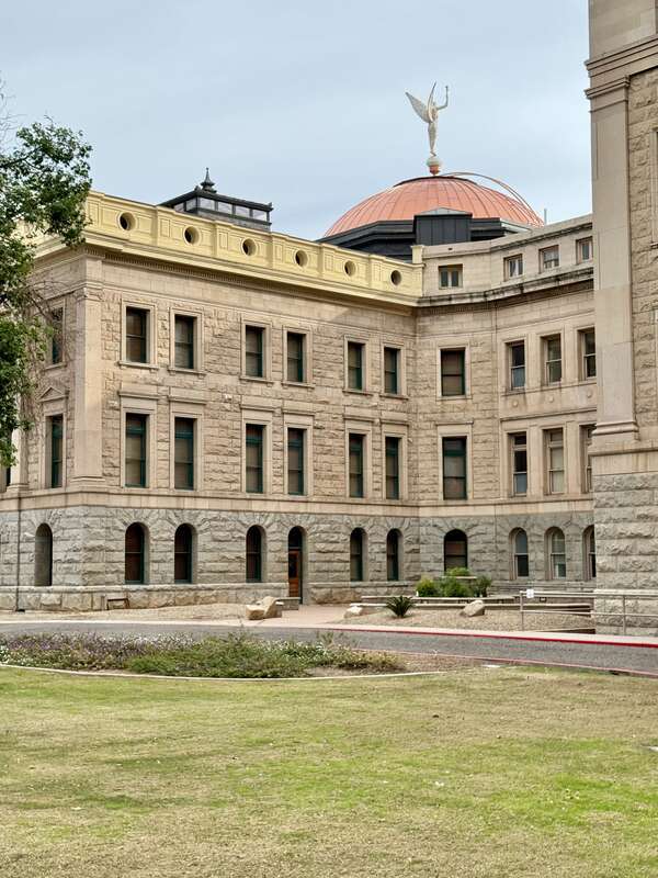 Built in 1899-1901, this Beaux Arts-style building was designed by James Riely Gordon to serve as the Arizona Territorial Capitol.  The building was expanded with additions to the west (rear) of the original structure in 1918-1919, designed by A.J.