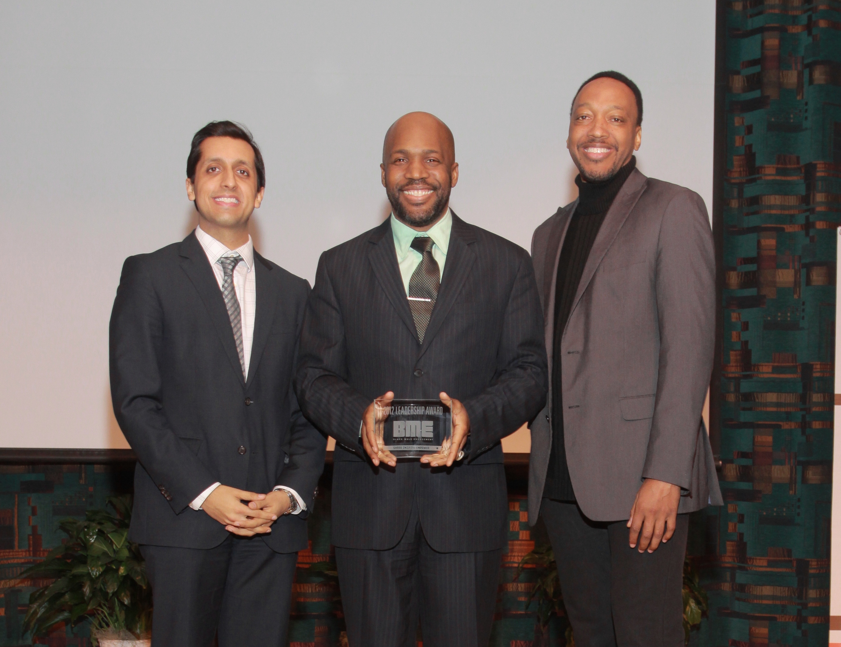 (l,r) Knight's Rishi Jaitly, BME award winner Curtis Lipscomb and Knight's Trabian Shorters