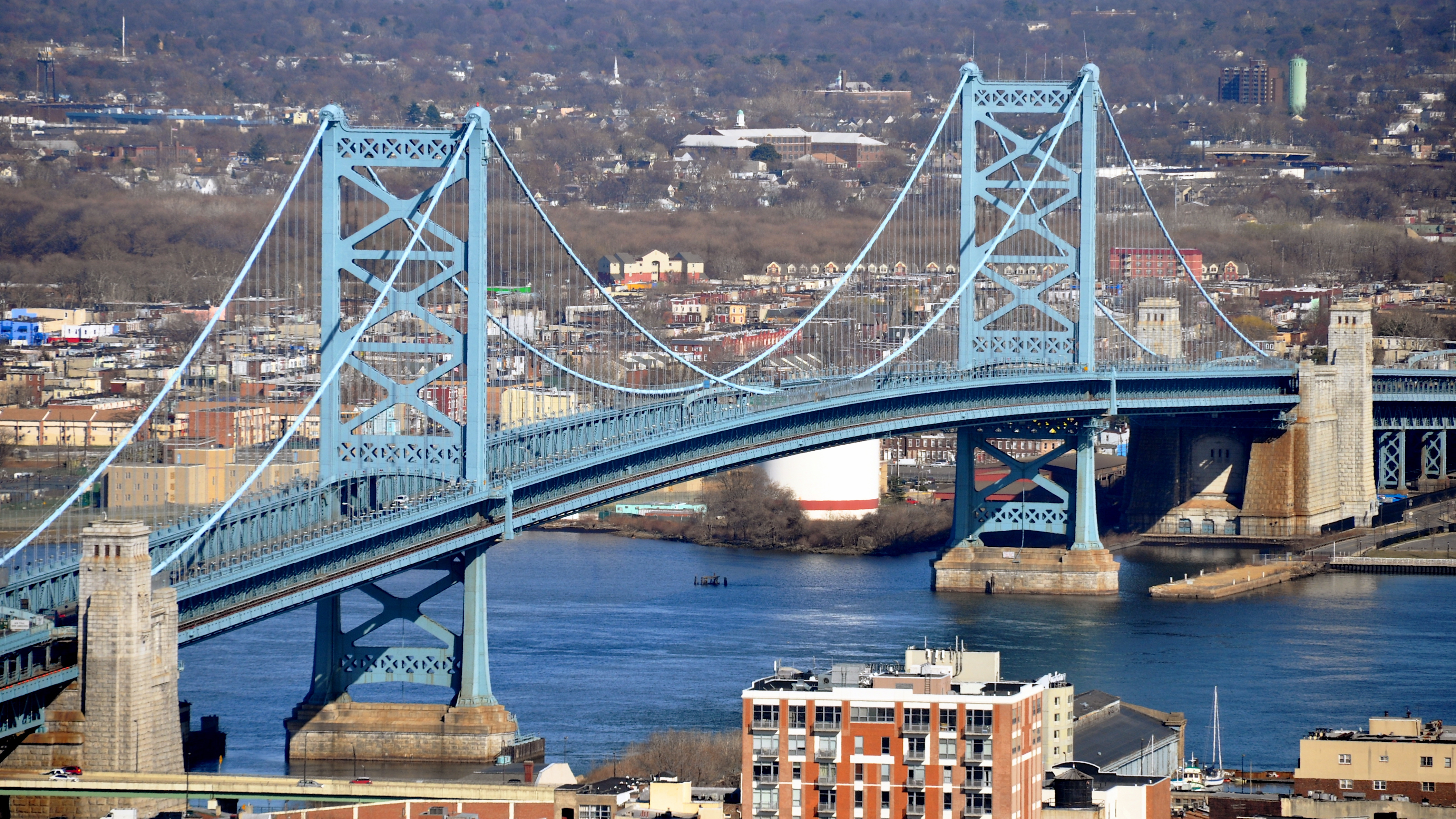 The Benjamin Franklin Bridge is a suspension bridge across the Delaware River connecting Philadelphia, Pennsylvania and Camden, New Jersey. View is from Philadelphia City Hall tower.