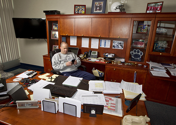 Penn State Head Football Coach Bill O’Brien in his office. bc2012015_046
Link to Photo: Common History
Credit: Bill Cramer/Wonderful Machine
Contact: connect@wonderfulmachine.com
Location: Lasch Football Building at Penn State’s University Park,