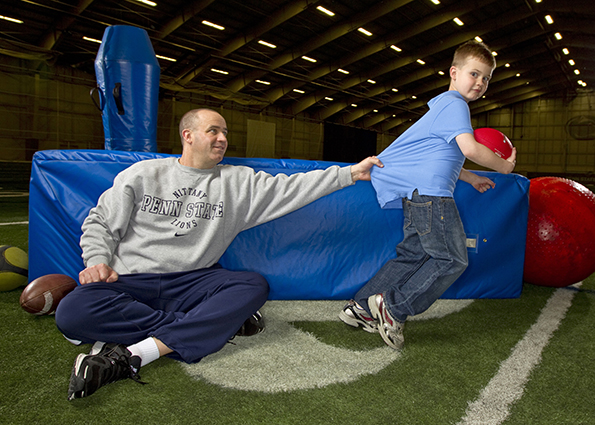 Penn State Head Football Coach Bill O’Brien with his son 7-year-old Michael. bc2012015_055
Link to Photo: Common History
Credit: Bill Cramer/Wonderful Machine
Contact: connect@wonderfulmachine.com
Location: Lasch Football Building at Penn State’s