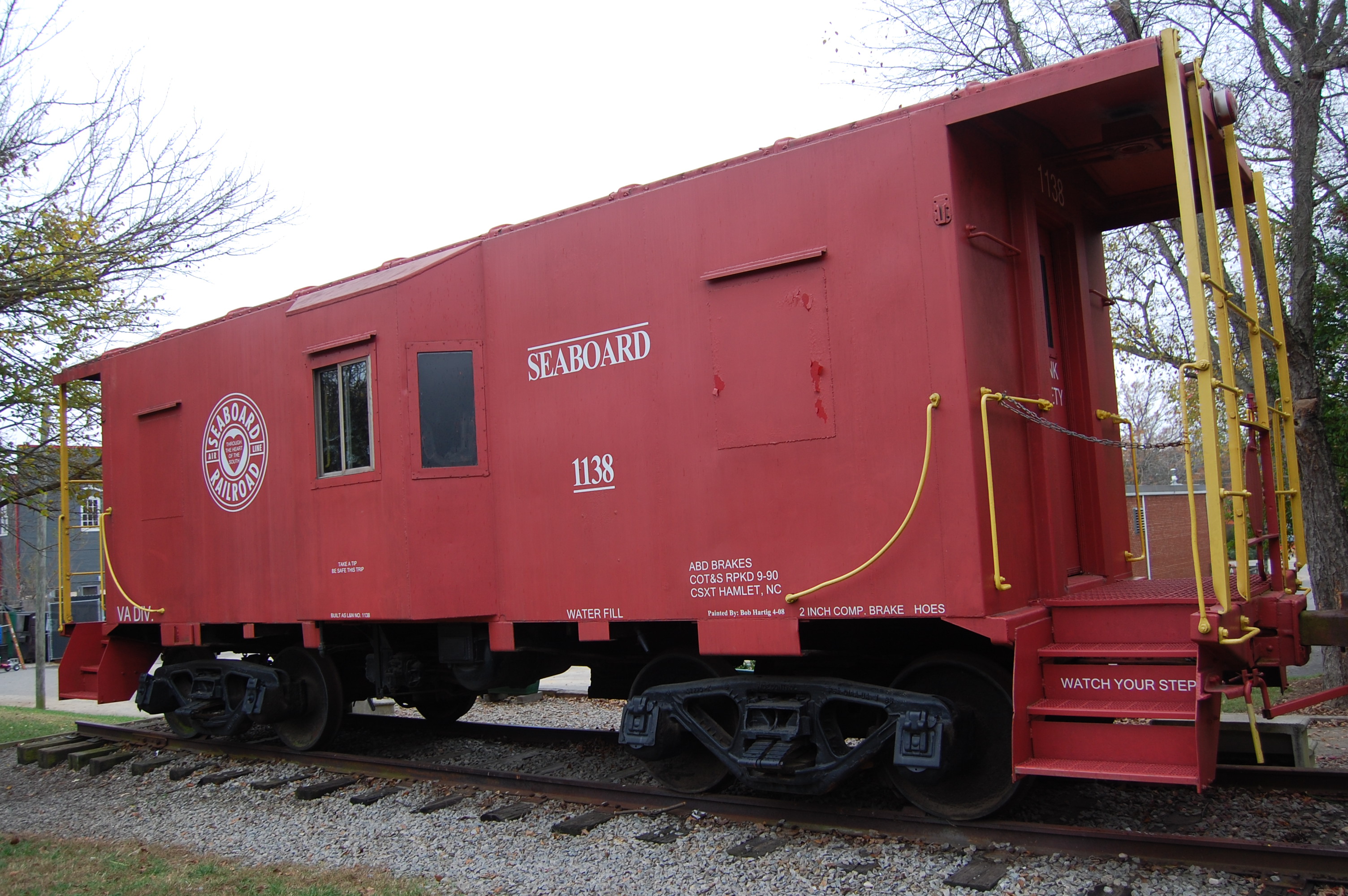 "This caboose, reflecting the railroad heritage of Apex is presented to it's citizens by the Apex Historical Society 5/2/92"  from display in front of the exhibit