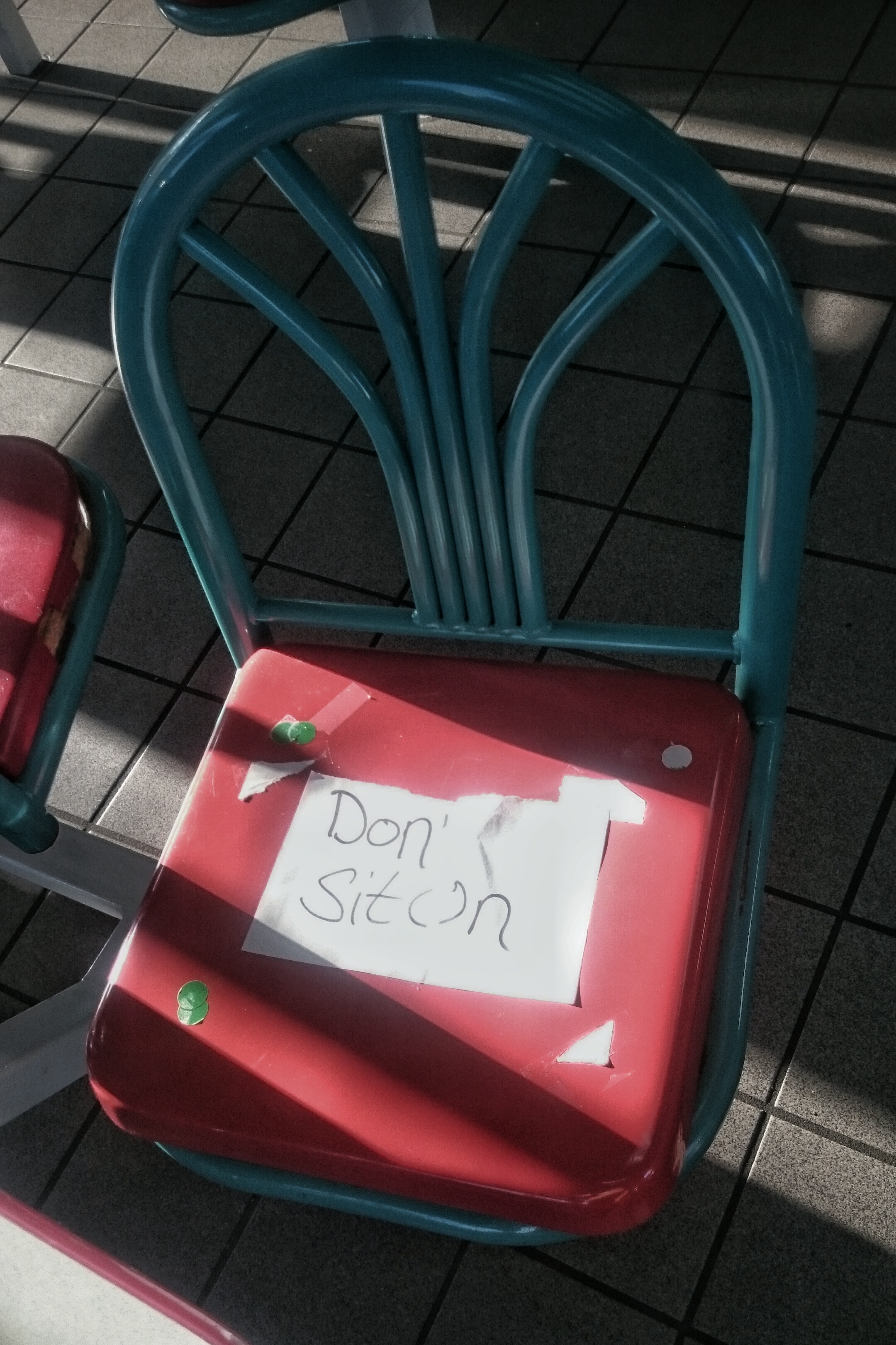 Why have a chair with a "don't sit on" sign, sort of defeats the purpose