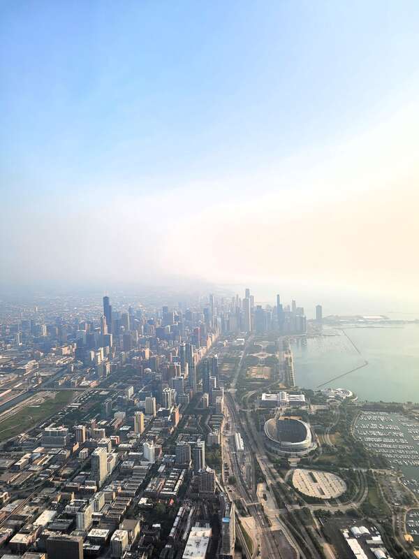 An aerial view of the city of Chicago with smoke from the Canadian wildfires in the air in late June 2023.