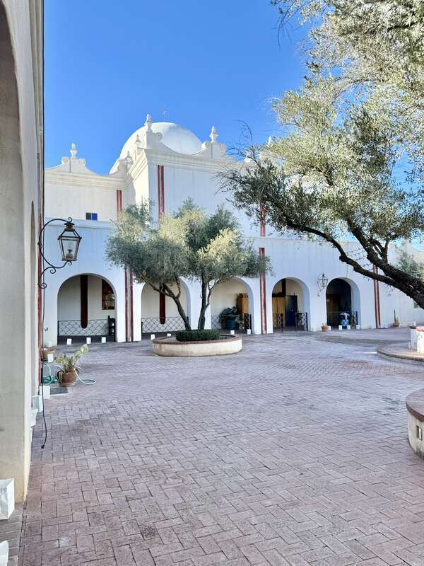 Built in 1783-1797, this Spanish Colonial-style building was built to serve as the Spanish Colonial Mission San Xavier del Bac, which was founded in 1692.  The mission serves as the Roman Catholic Parish Church for the Tohono O'odham Nation San