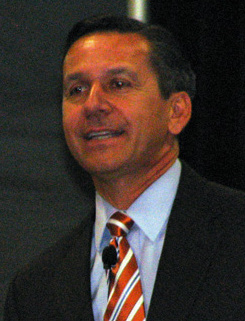 Good speech today from gubernatorial candidate Dino Rossi. Seems like a very humble, regular guy.
The lighting at TRAC was awful, and I was a bit too far away to get any real good pix, so this one (and the other) have been cleaned up as much as