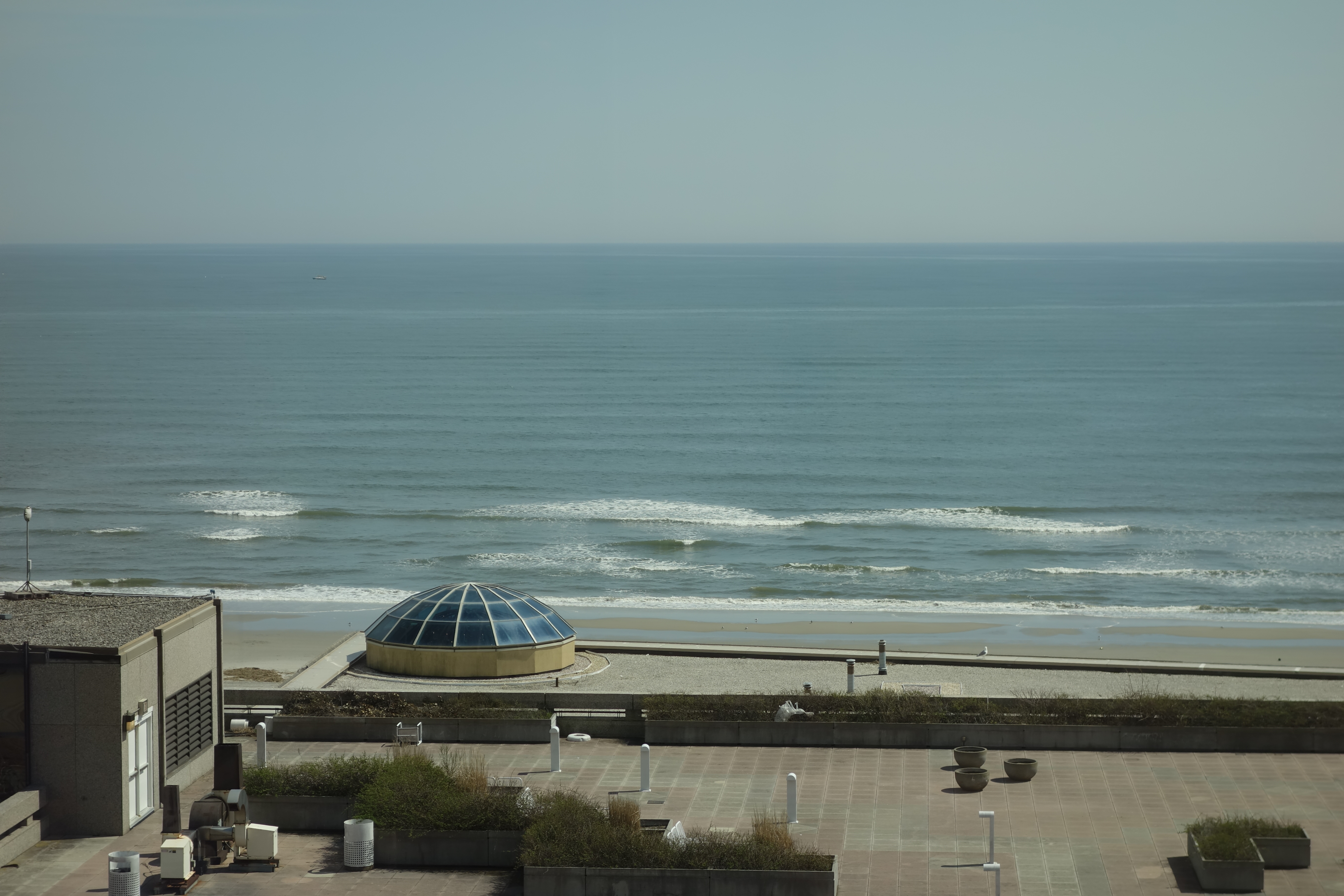 Looking from the Bally's Tower of Bally's Atlantic City toward the beach and the Atlantic Ocean, above Park Place / South Ohio Avenue and the Boardwalk in Atlantic City, New Jersey.