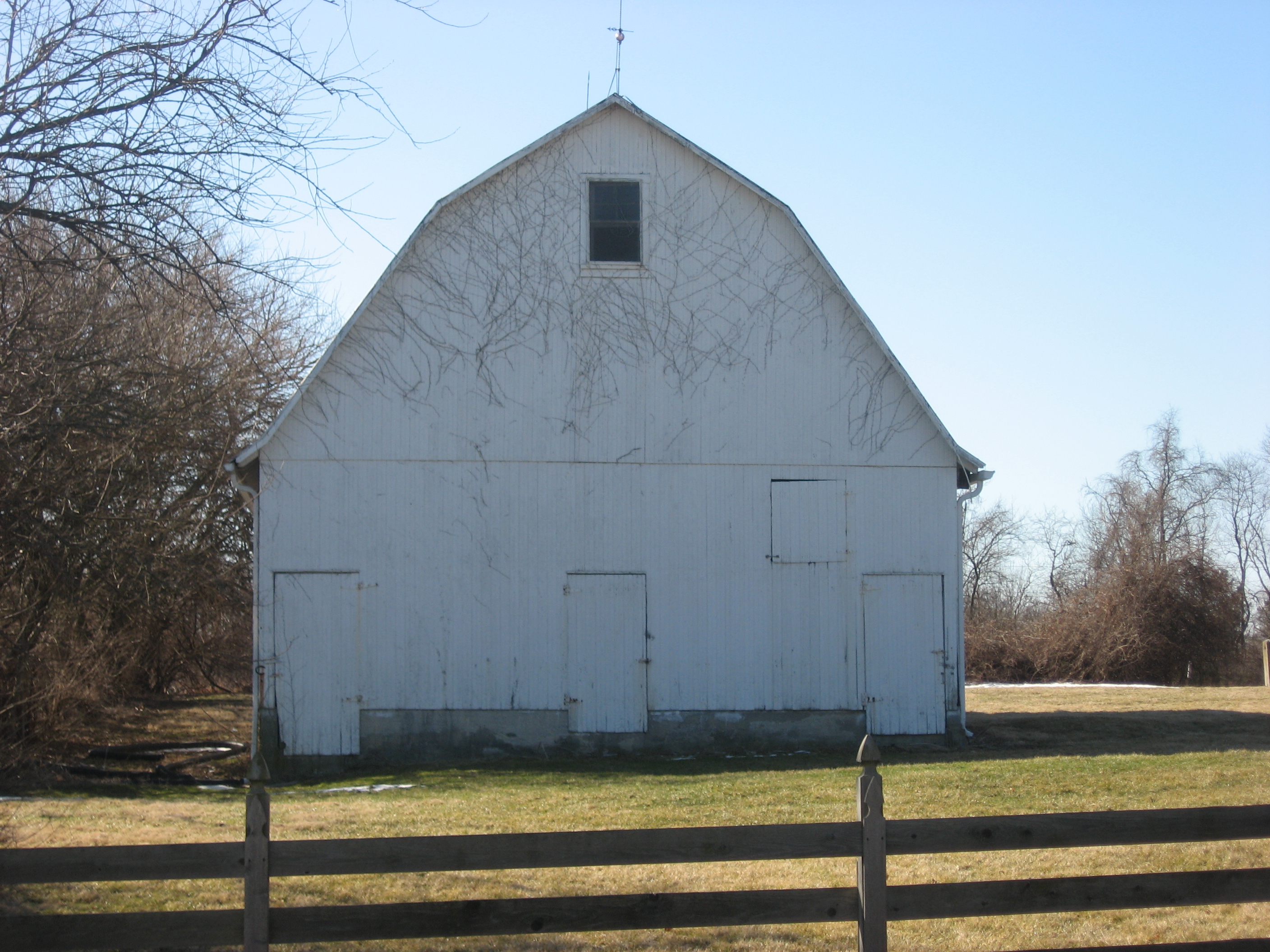 Front of the gambrel-roofed barn at the Hinkle-Garton Farmstead, located at 2920 E. Tenth Street in Bloomington, Indiana, United States. The farm complex is listed on the National Register of Historic Places.