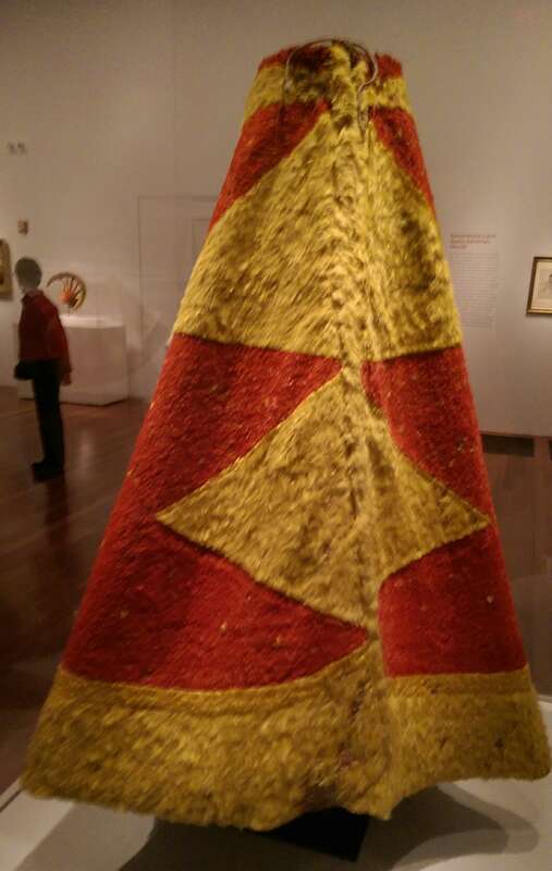 A feathered cape associated with Hawaiian monarch Kalaniopuu (1729 - 1782), on display at the de Young Museum in San Francisco. Photo by Jim Heaphy.
