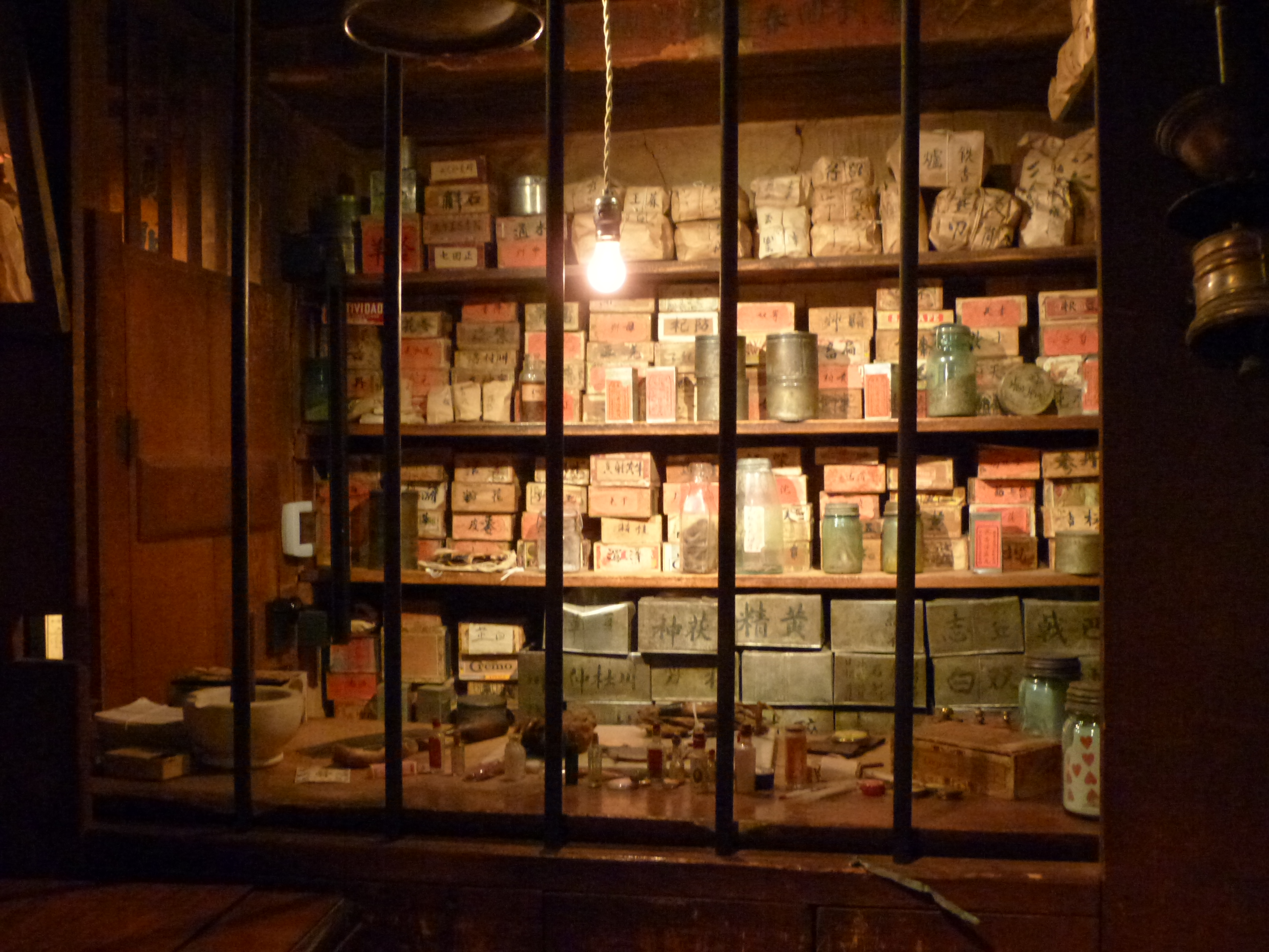Ing Hay's apothecary window in the historic Kam Wah Chung Company Building, John Day, Oregon, United States.