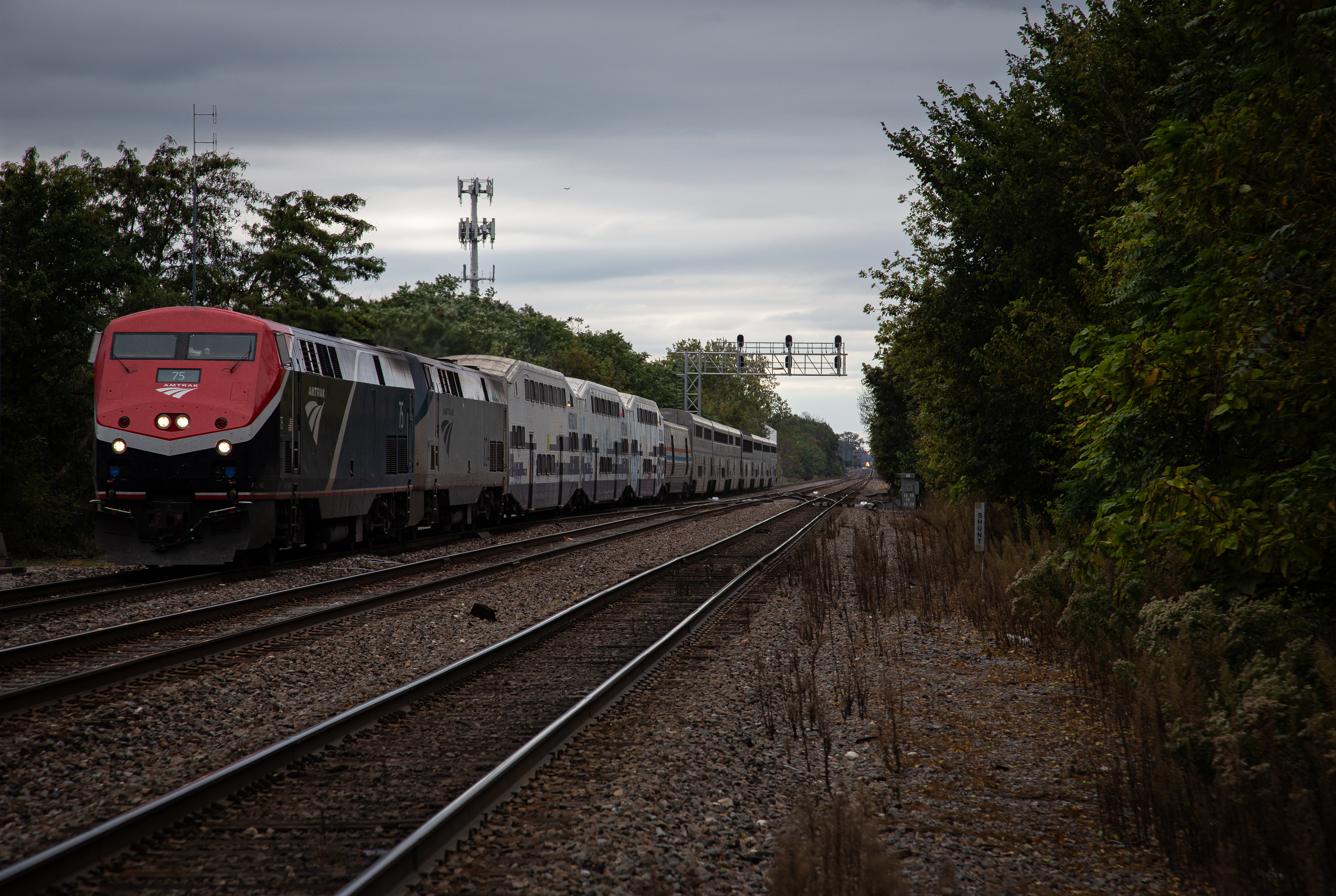 The eastbound Southwest Chief arriving at Naperville in September 2024. The train includes several Metrolink coaches bound for rebuild in Wisconsin.