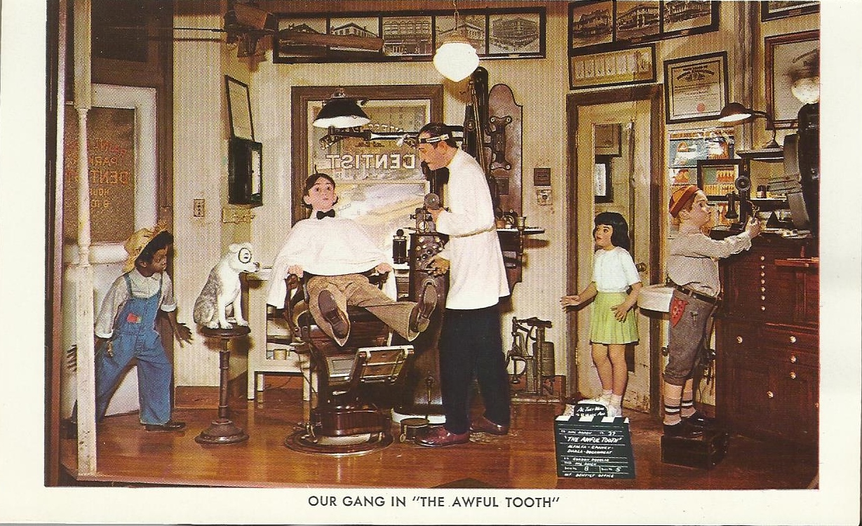 Judy and I visited the Movieland Wax Museum in Buena Park, CA, in August 1969.

The museum opened in 1962. and closed in 2005.  During its time, 10 million people visited the museum.

A postcard of Our Gang in "The Awful Tooth".