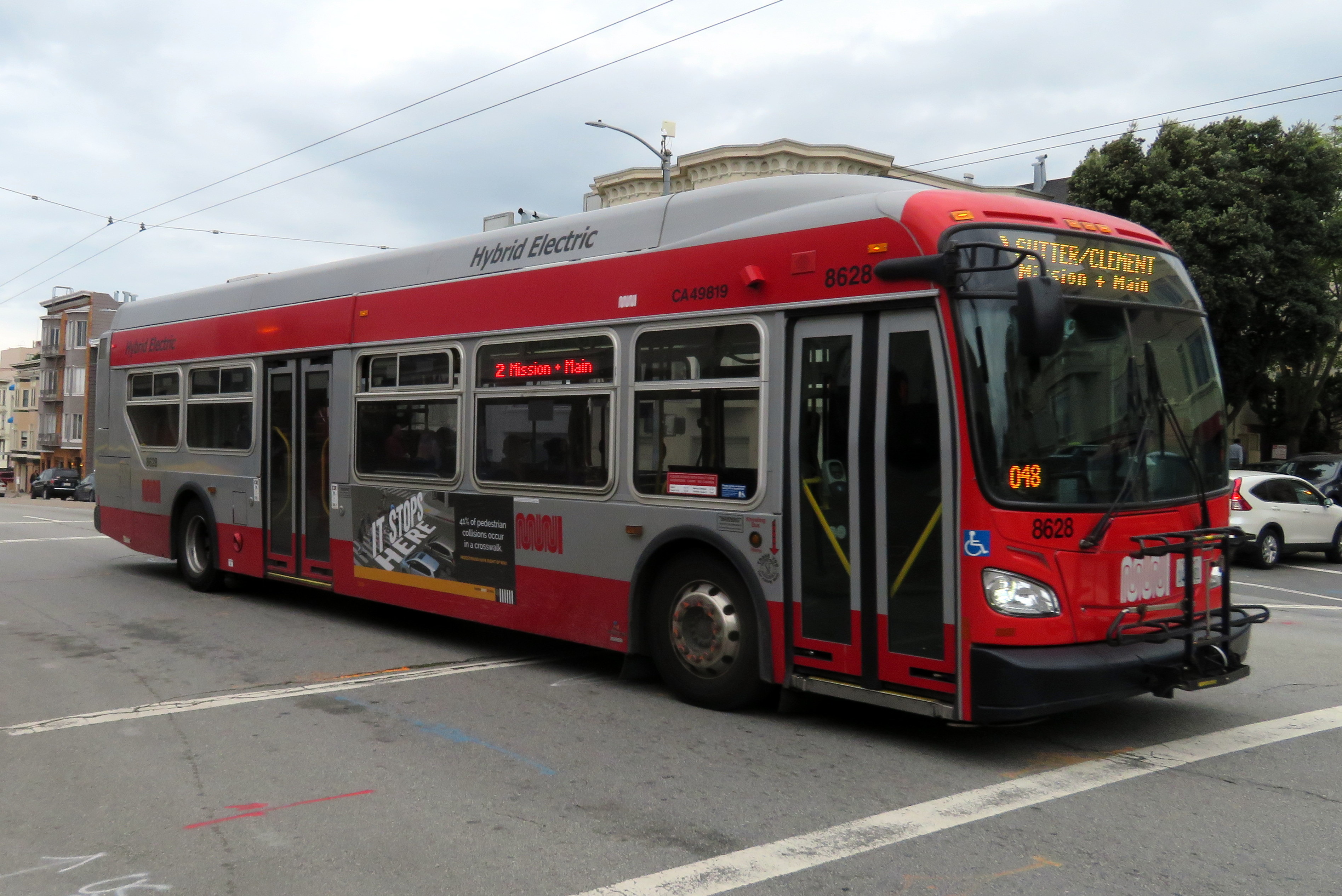 Muni route 2 bus in an unusual color scheme in March 2018