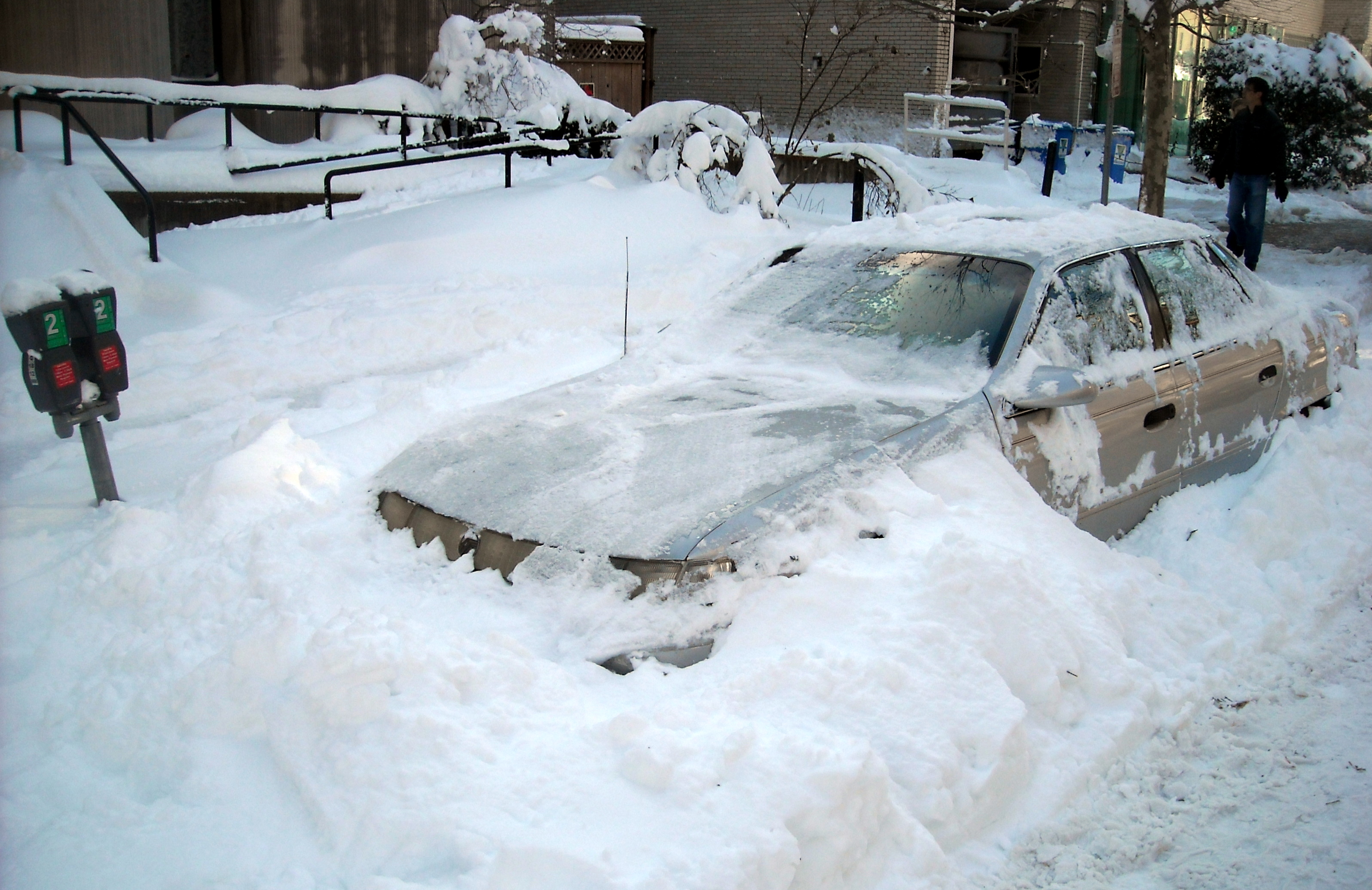 A snow-covered vehicle parked on the 1800 block of Q Street, N.W., in the Dupont Circle neighborhood of Washington, D.C., following the North American blizzard of 2010.