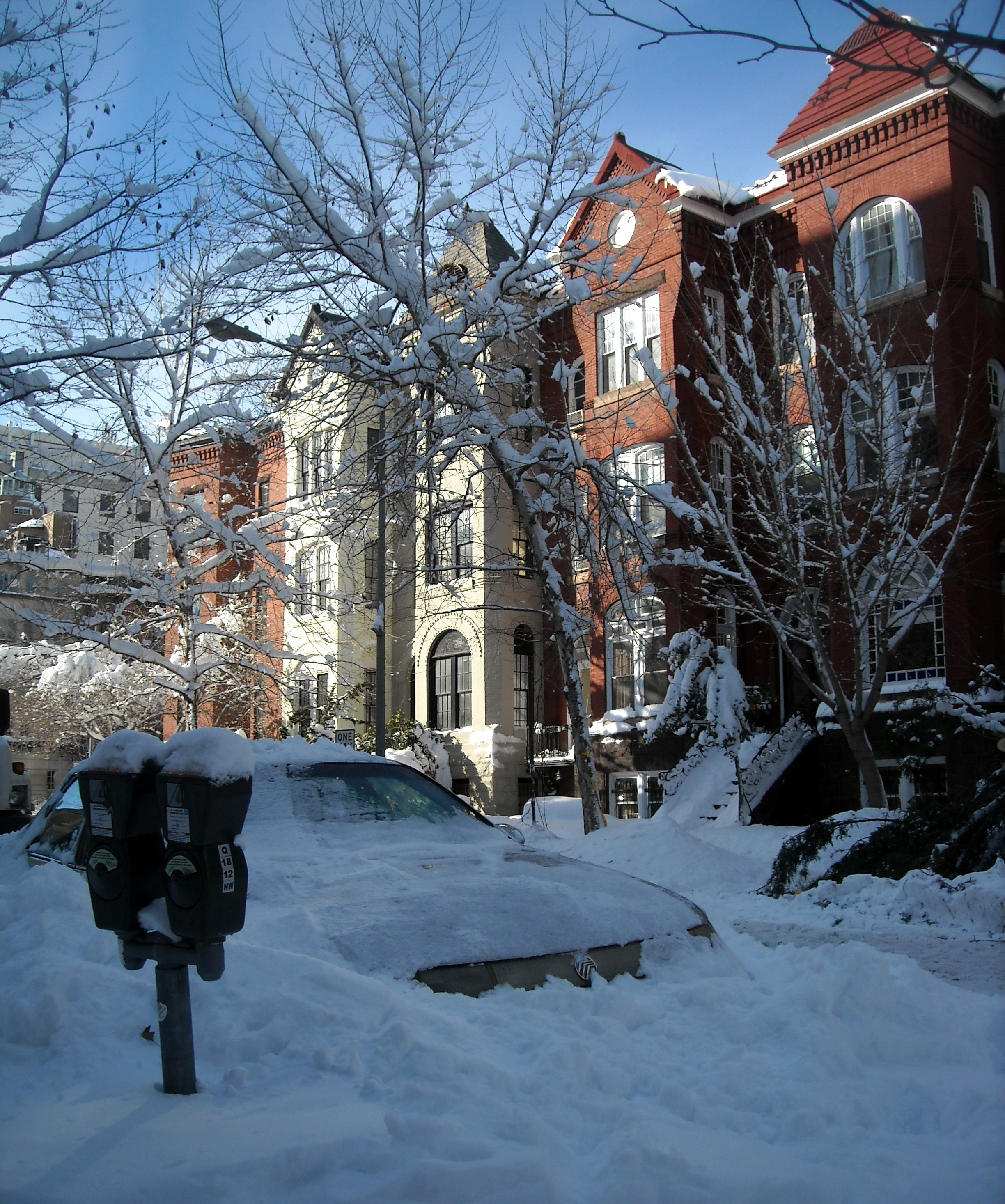 A snow-covered vehicle parked on the 1800 block of Q Street, N.W., in the Dupont Circle neighborhood of Washington, D.C., following the North American blizzard of 2010.