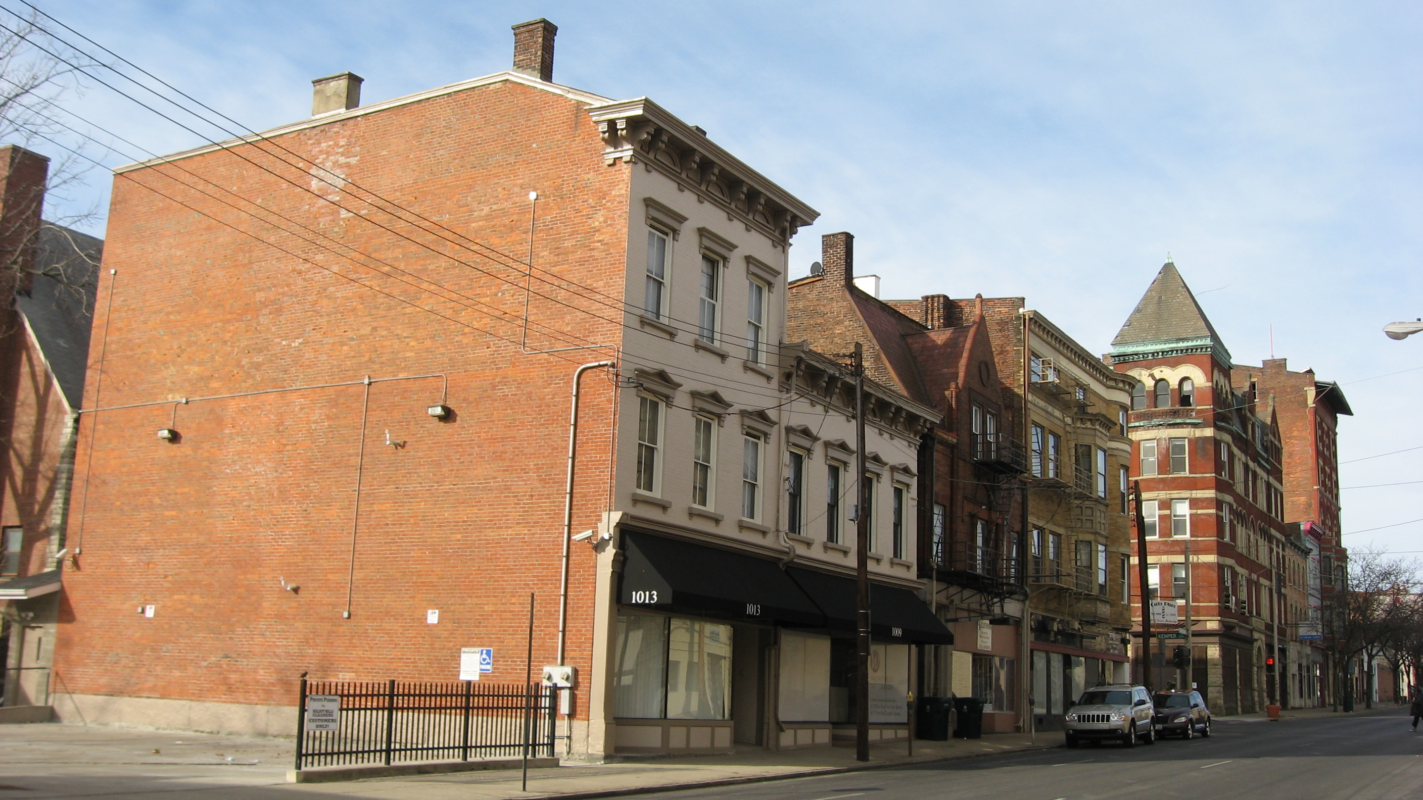 Buildings on the southern side of the 1000 block of E. McMillan Street in the Walnut Hills neighborhood of Cincinnati, Ohio, United States.  This block is part of the Peeble's Corner Historic District, a historic district that is listed on the